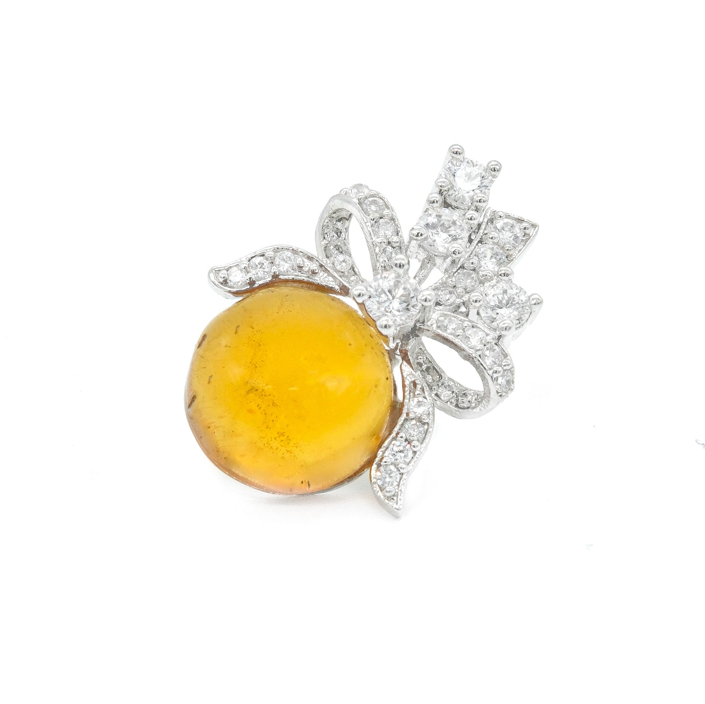 close-up yellow stone bow shaped earrings