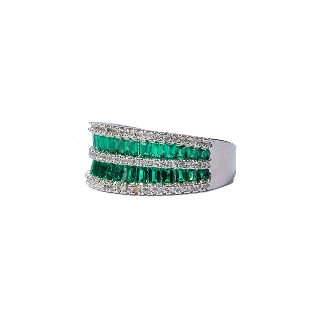 Diagonal view of triple row green CZ ring with curved edges and sparkle finish
