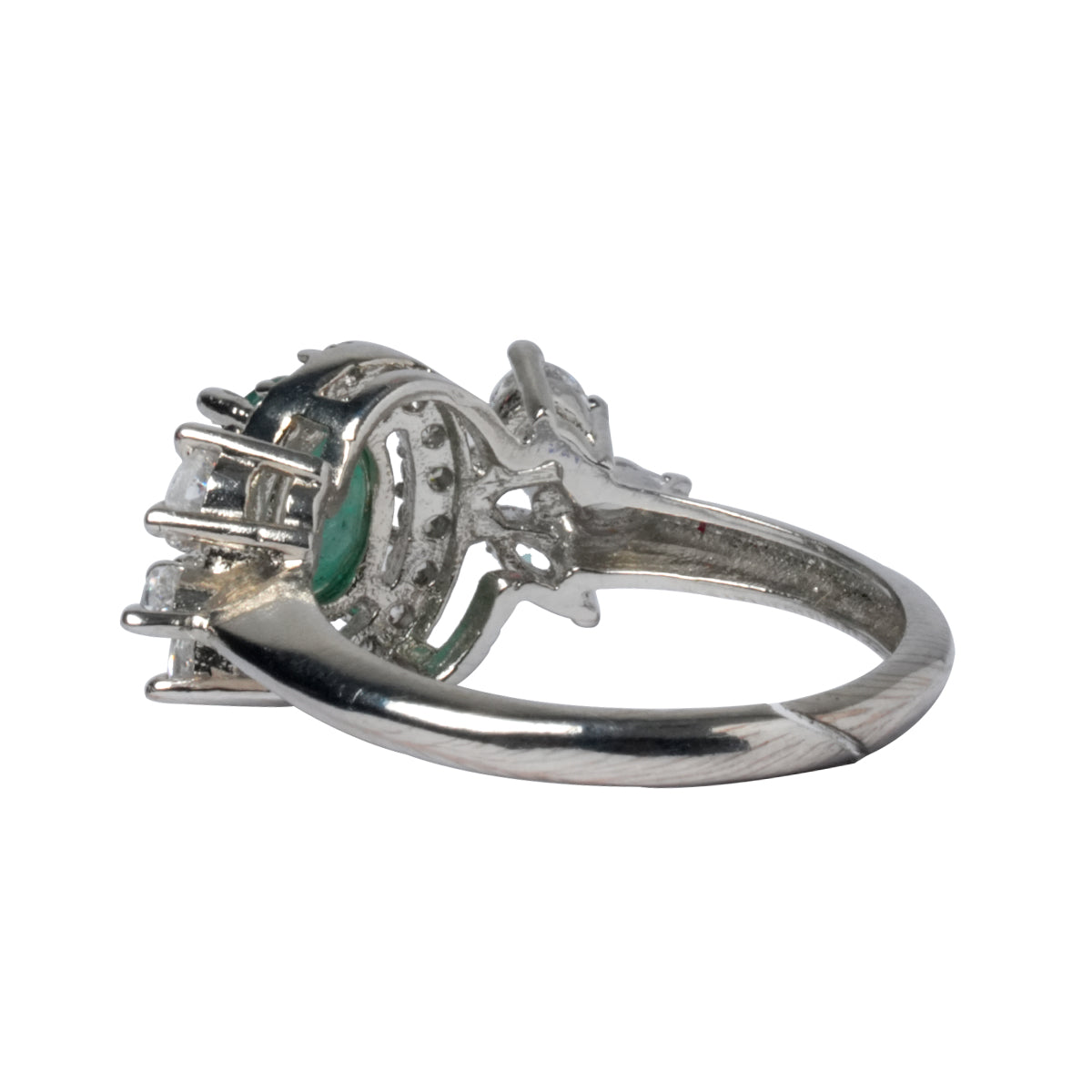Side view of green CZ ring showing smooth band and raised setting
