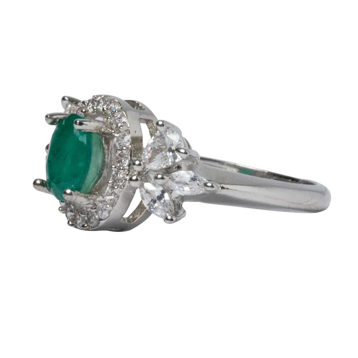 Side profile of green CZ ring showing raised center stone and setting