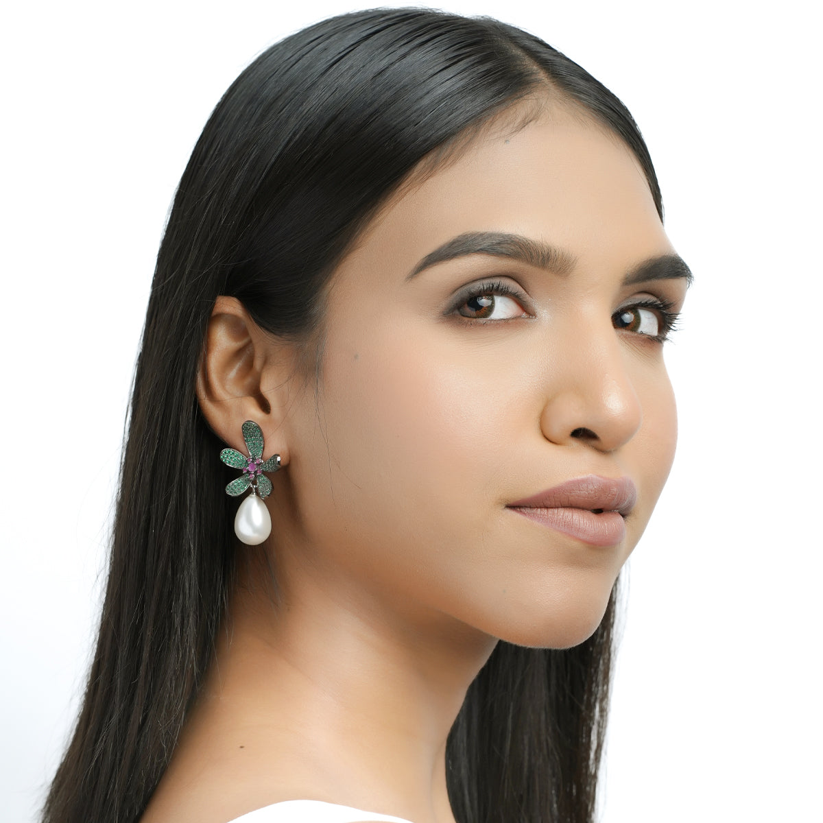Full-face model image wearing flower pearl earrings