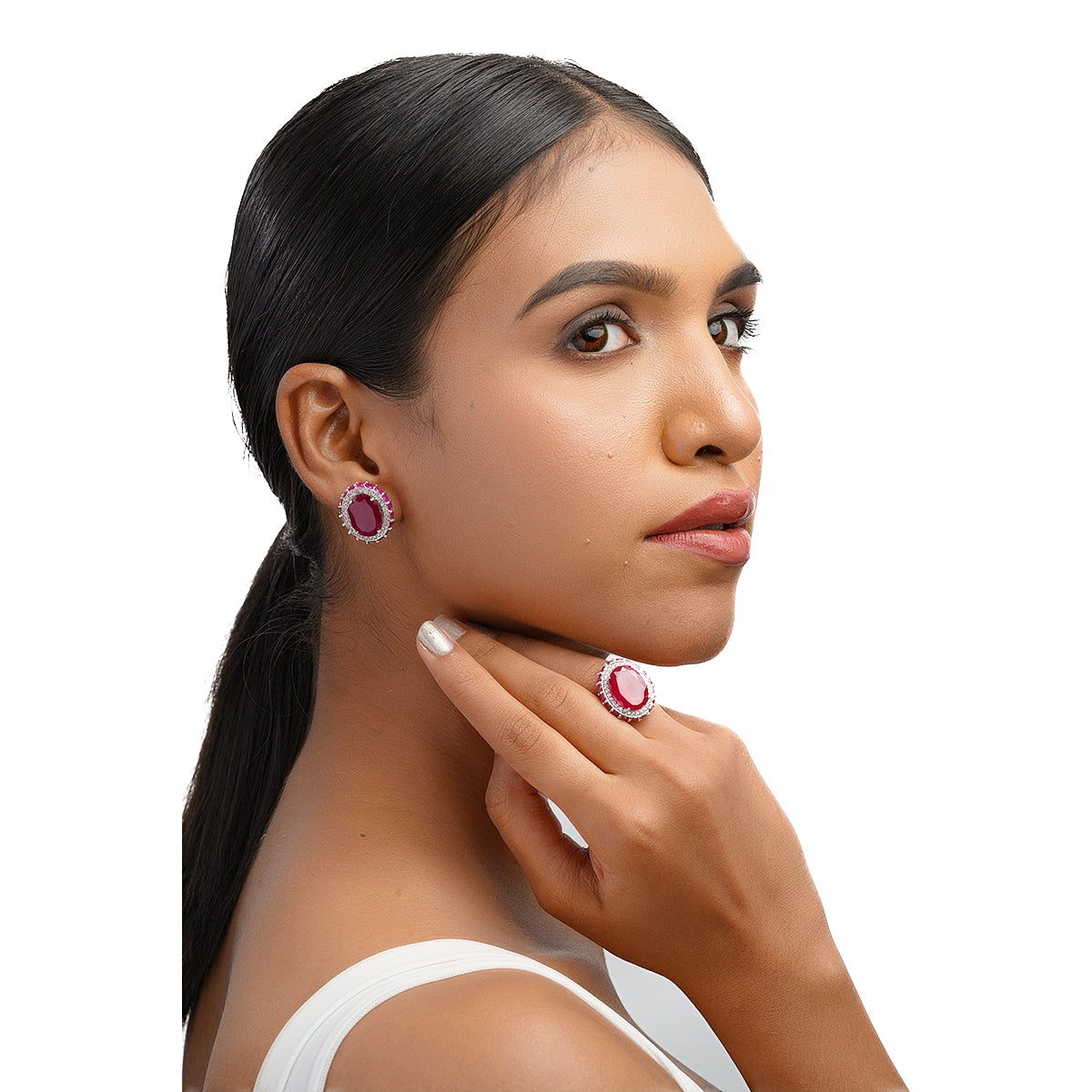 Model wearing oval pink ruby and CZ stud earrings