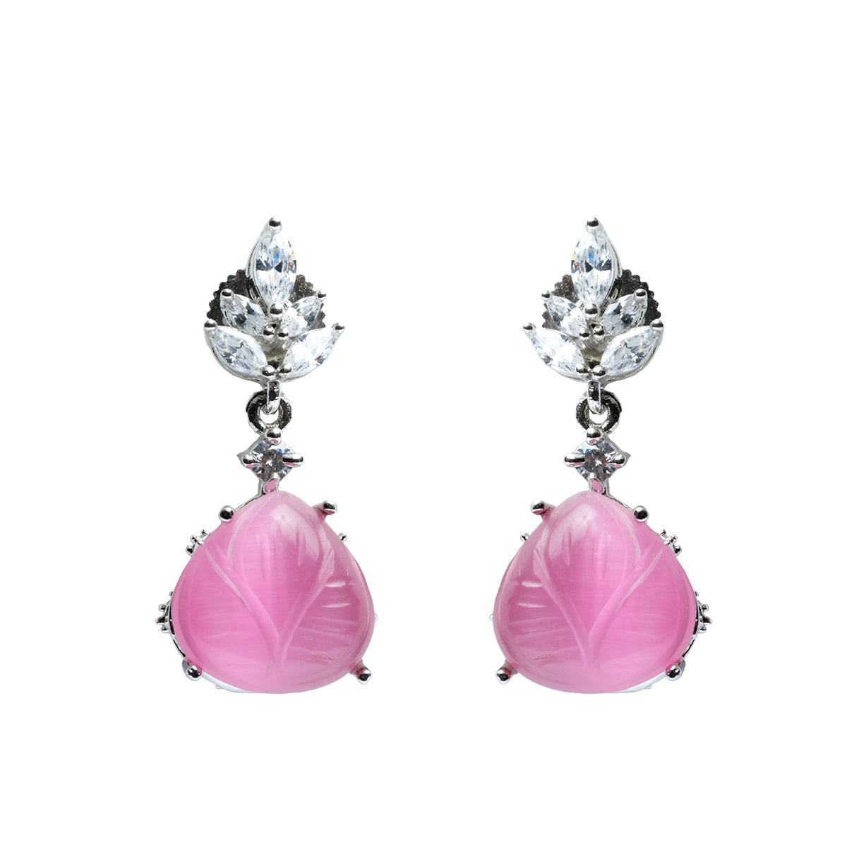 Side-by-side pink carved stone earrings with stud tops