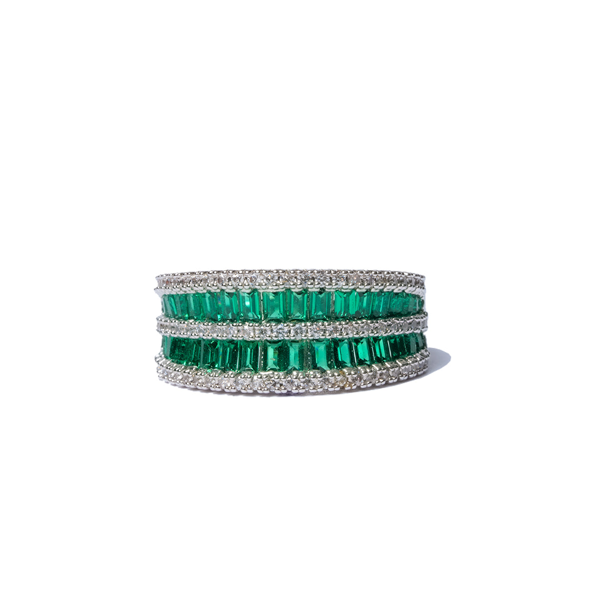 Side view of green baguette band ring with white CZ