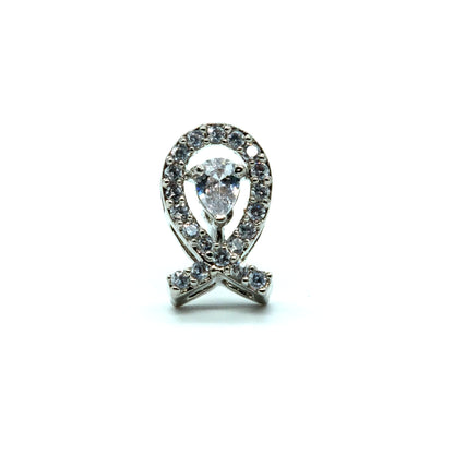 A silver-tone ankh symbol pendant or ring embellished with clear gemstones, including a pear-cut center stone, set against a plain white background.