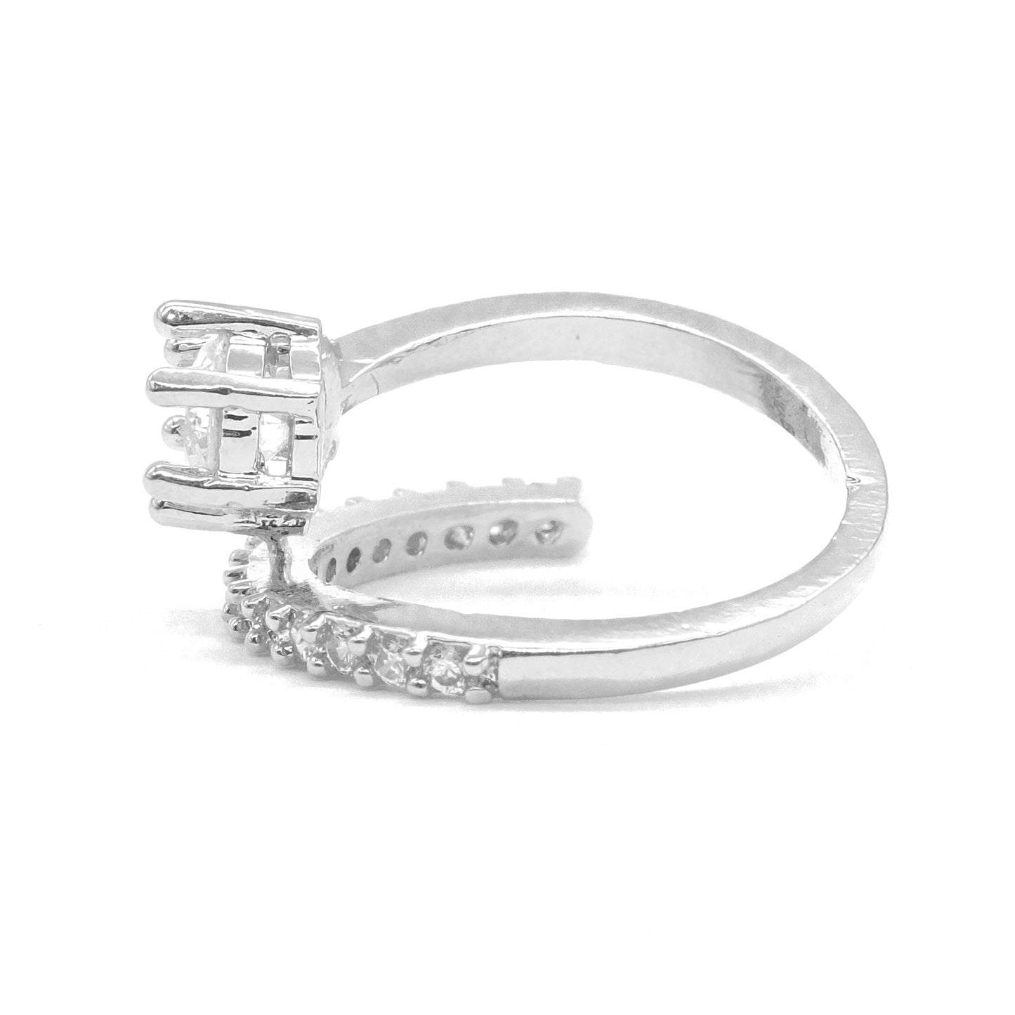 A silver-toned ring featuring a multi-stone crown setting and a pavé band with small clear stones, shown on a plain white background.