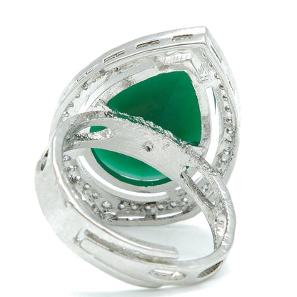 A silver ring featuring a triangular green gemstone surrounded by small clear stones, set against a plain white background.