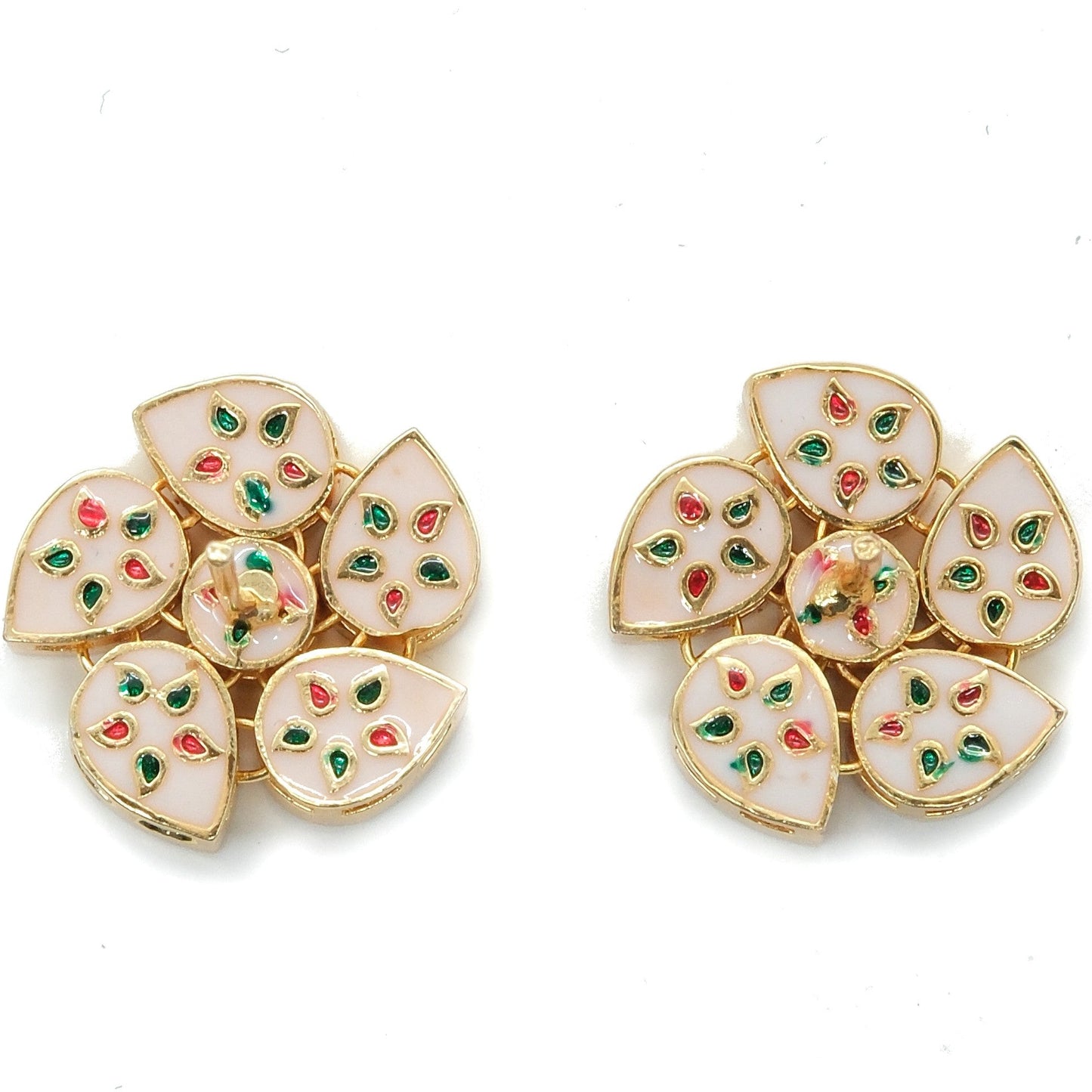 A pair of gold-plated floral stud earrings with white enamel petals and small red and green floral accents, displayed on a clean white background.