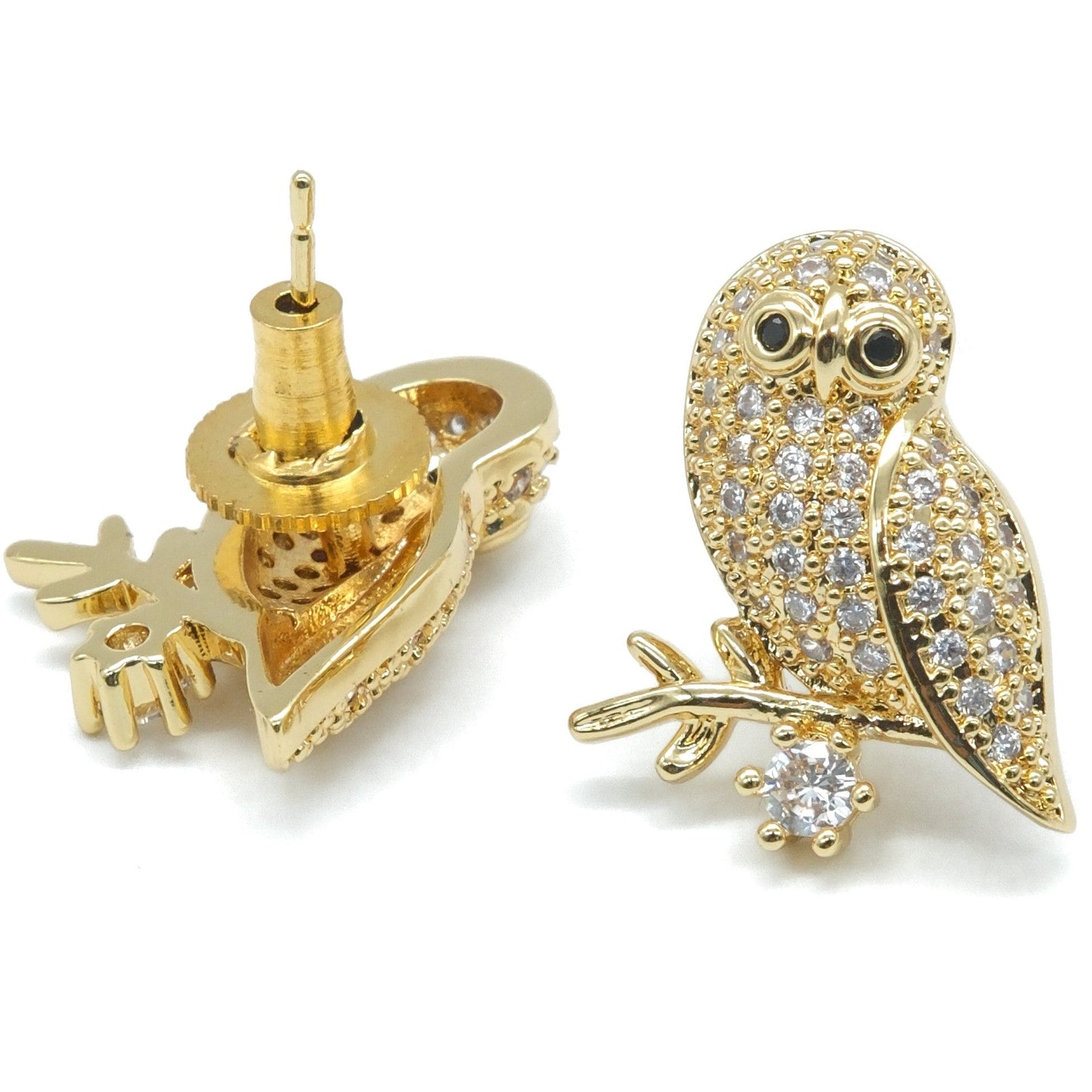 Gold owl stud earrings paved with clear cubic zirconia, with one earring showing the post and backing and the other showing the front profile on a white background.