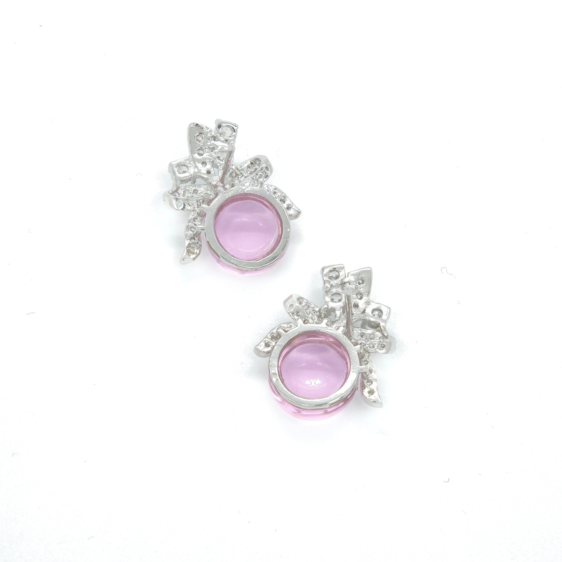  back view of baby pink color stud earrings 