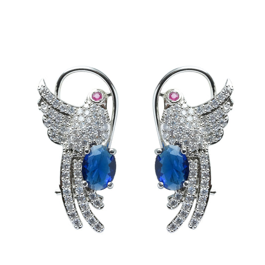 Front view of bird-shaped blue sapphire earrings with American diamond accents on white background