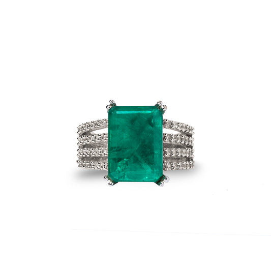 Front view of bold green rectangle ring with CZ sparkle on sides