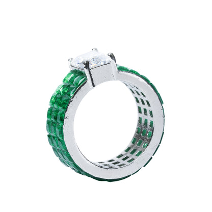 Angled view of green ring showing band curve and stones