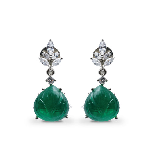 Front view of green carved stone dangle earrings with CZ