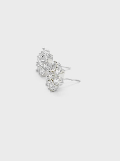 Close-up product video of Floral American Diamond Stud Earrings showcasing the sparkling floral design, American diamonds, and premium finish.