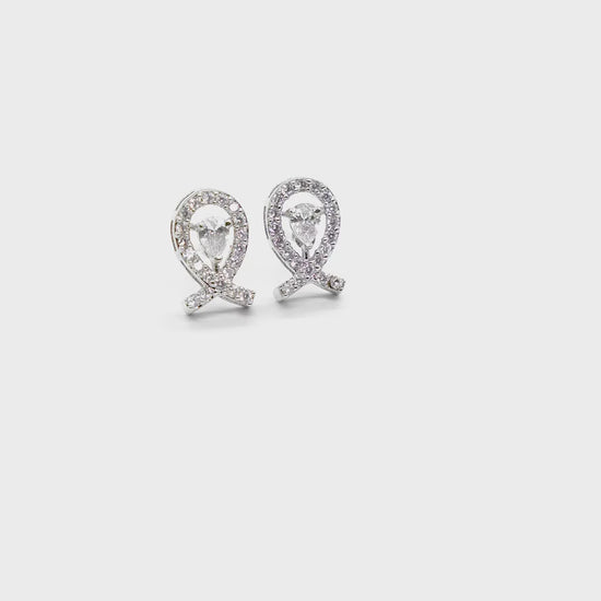 Close-up product video of Infinity American Diamond Earrings showcasing the elegant infinity design, sparkling American diamonds, and premium craftsmanship.