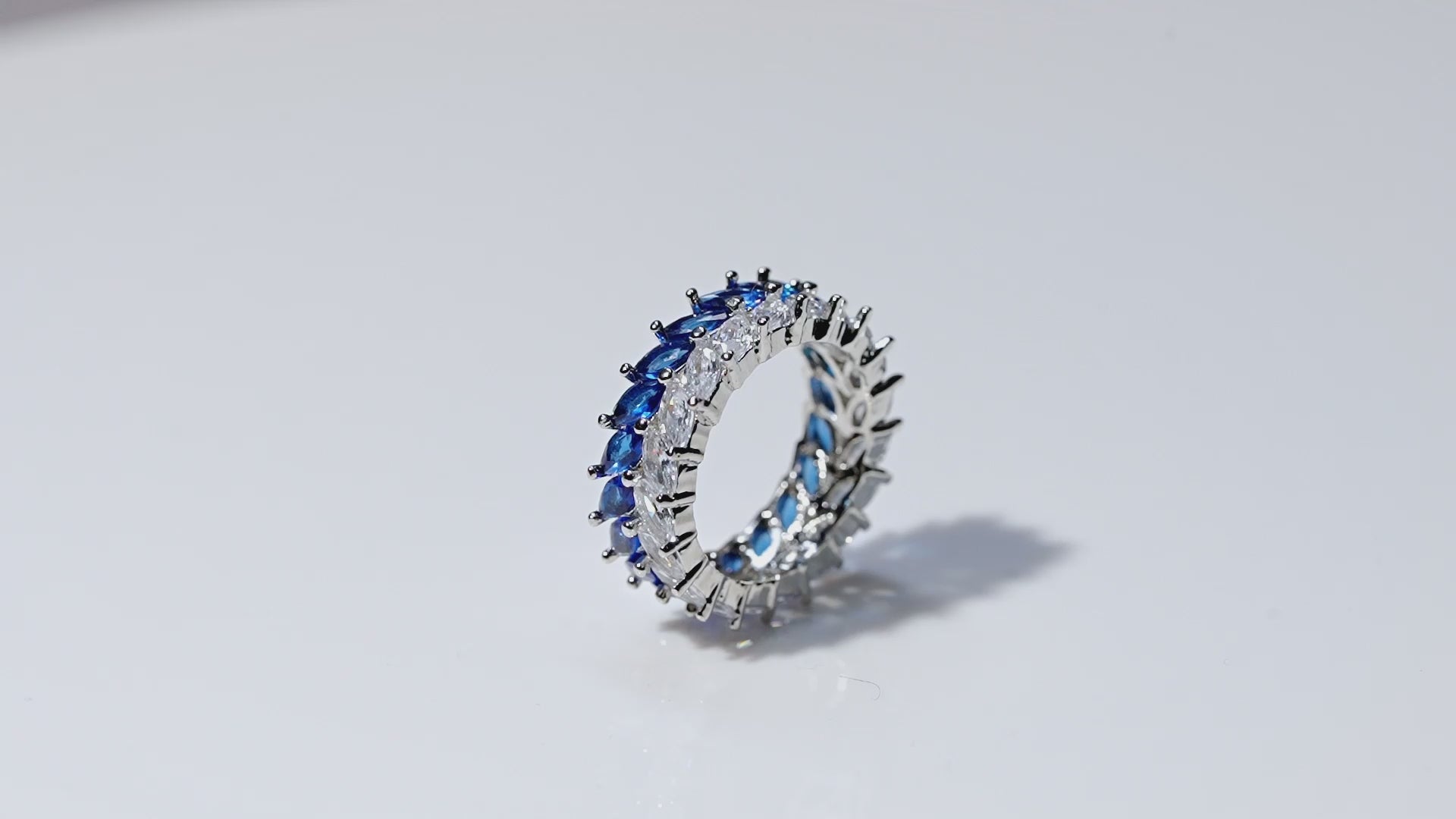 Alternating Baguette-Cut Blue Sapphire and 1/6 CT. T.W.