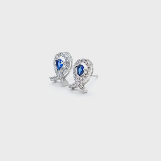 Close-up product video of Blue Teardrop American Diamond Earrings showcasing the blue teardrop stones, sparkling American diamonds, and premium craftsmanship.