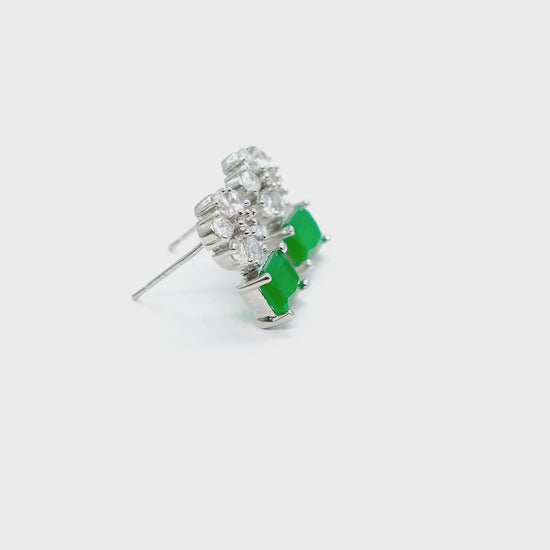 Close-up product video of Green American Diamond Drop Earrings showcasing the vibrant green stones, sparkling American diamonds, and premium craftsmanship.