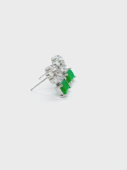 Close-up product video of Green American Diamond Drop Earrings showcasing the vibrant green stones, sparkling American diamonds, and premium craftsmanship.