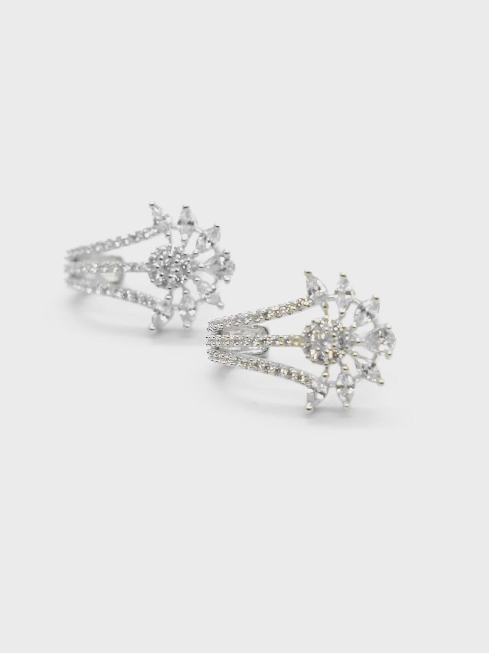 Close-up product video of Floral American Diamond Drop Earrings showcasing the sparkling floral design, American diamonds, and elegant craftsmanship.