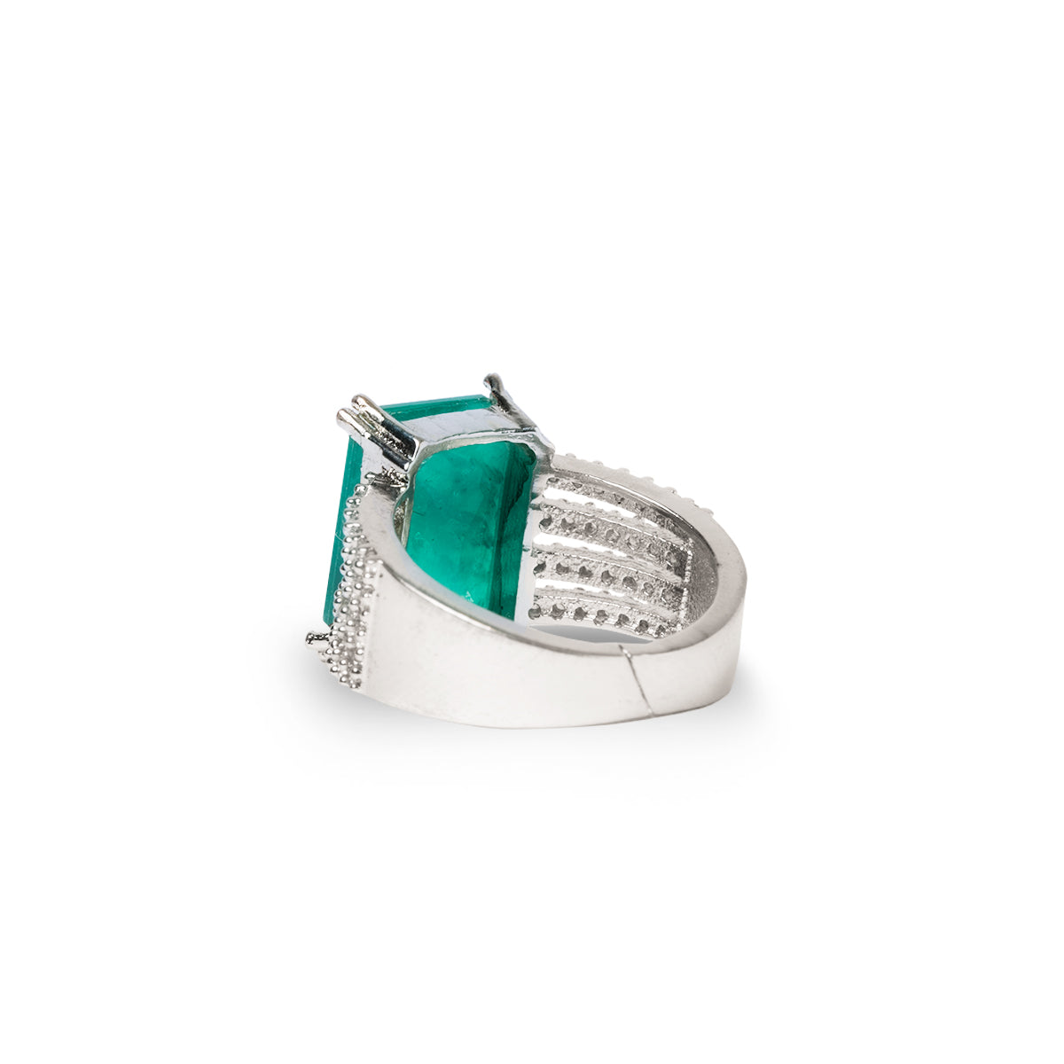 Side view of bold green ring showing stone height and sparkle band