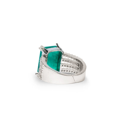 Side view of bold green ring showing stone height and sparkle band