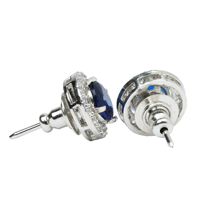 Side view of blue stud earrings with silver post and push back