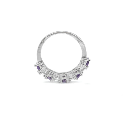 A silver ring featuring a semi-circular band adorned with small rectangular purple gemstones and clear stones, shown on a plain white background.
