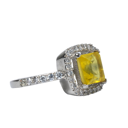 Side angle of yellow CZ ring showing raised setting and side design